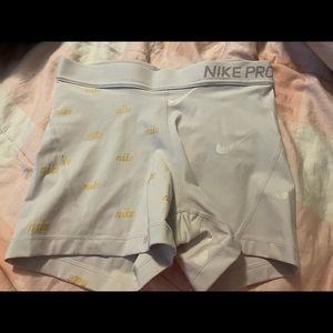 Nike Pros with Swoosh and Nike on legs
